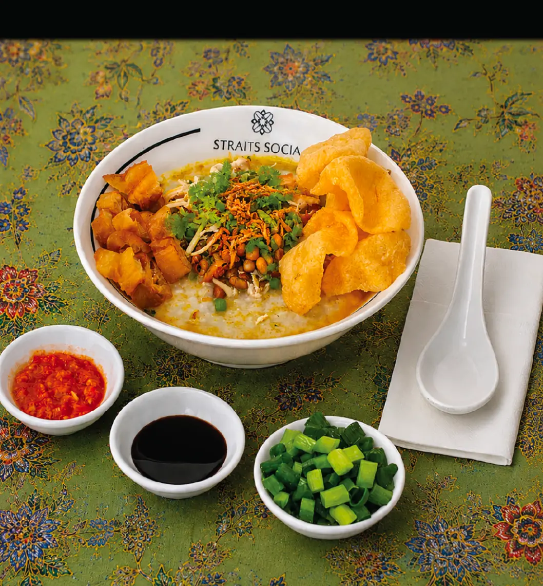 Bubur Kampoeng with fried dough and shredded chicken
